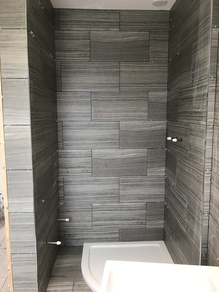 Bathroom refurb — shower tiling in progress