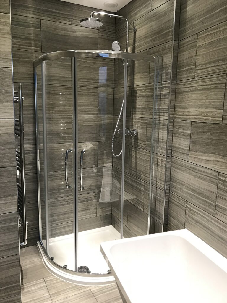 Bathroom refurb — new curved glass shower