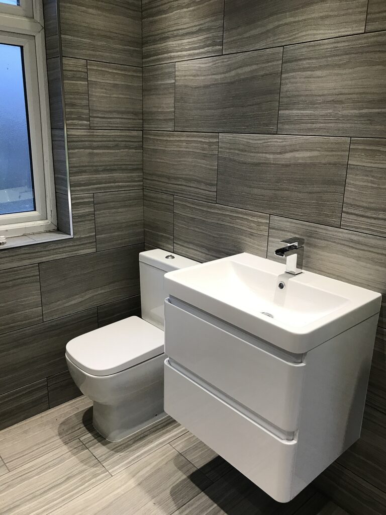 Bathroom refurb — new basin, WC and grey tiling